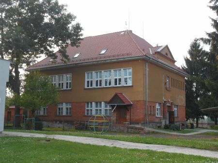zš